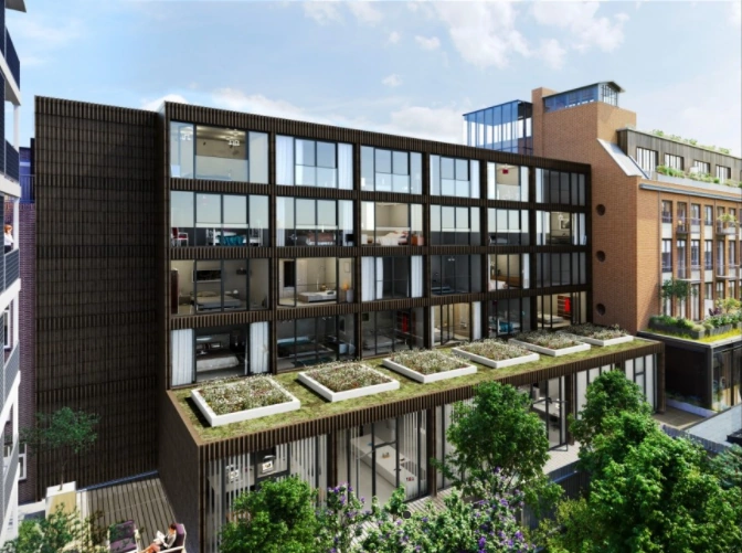 Modern appartementencomplex aan de Karel du Jardinstraat met grote ramen en groene dakterrassen.